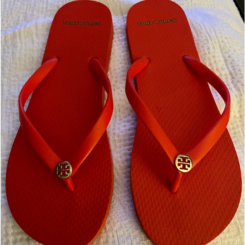 Tory Burch orange flip flops size 9 new without tags